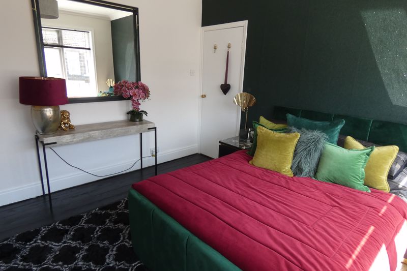 Bedroom One- click for photo gallery
